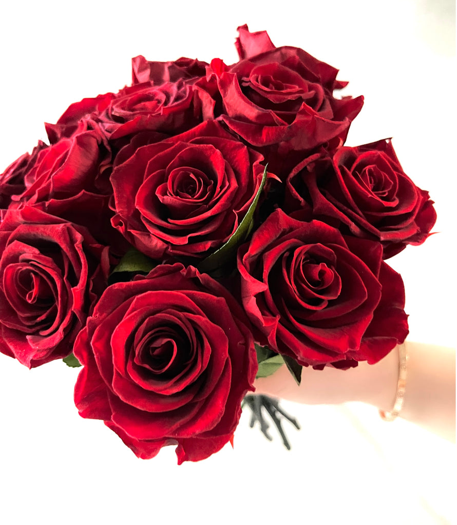 Burgundy red preserved eternity roses with rich, velvety petals in a deep, elegant shade. The roses maintain their vibrant colour and natural texture, offering a timeless and sophisticated symbol of love and beauty.